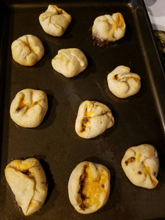 A picture of Taco stuffed biscuits with Taco Butter.