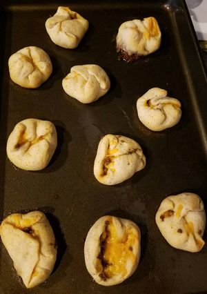 A picture of Taco stuffed biscuits with Taco Butter.