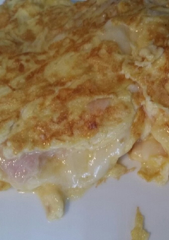 Una foto de Tortilla de Jamón con queso