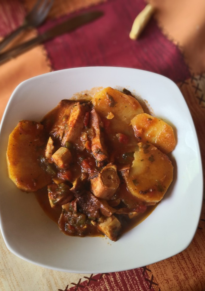 Una foto de Rejos de pota en salsa a dos manos