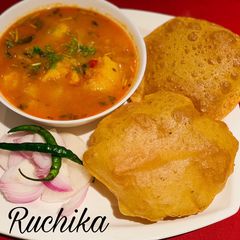 A picture of Achari masala poori.