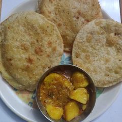 A picture of Radhaballavi with Aloo Dum.