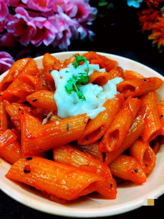 A picture of Red sauce pasta.