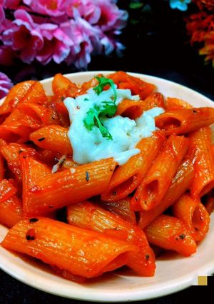 A picture of Red sauce pasta.