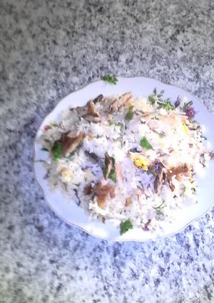 Una foto de Arroz chaufa de pescado peruano