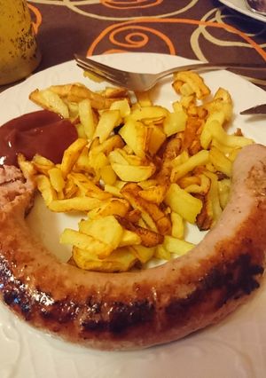 Una foto de Butifarra al vino con patatas