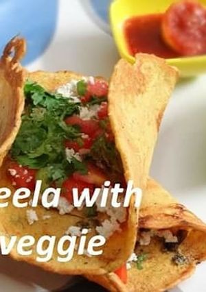 A picture of Healthy besan Cheela with Panner and Veggie.