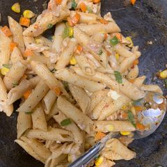 A picture of Veg pasta-red pasta-homemade pasta.
