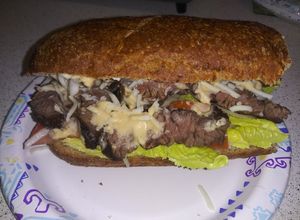 Una foto de Sandwich integral de asada