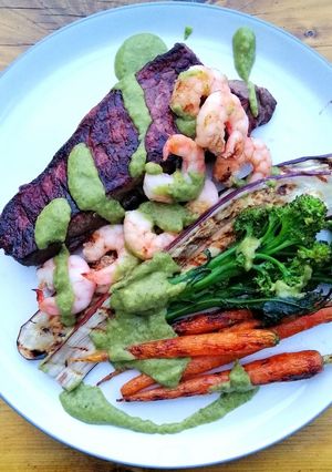 A picture of Surf and turf / grilled veg / avocado chimichurri.