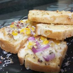 A picture of Cheesy Garlic Bread.