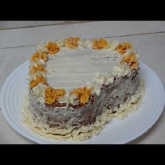 A picture of Rustic Carrot cake with vanilla buttercream #themechallenge.