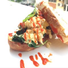 A picture of Scrambled Eggs With Basil Blue Cheese Sandwich.