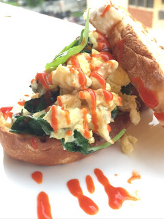 A picture of Scrambled Eggs With Basil Blue Cheese Sandwich.