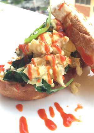 A picture of Scrambled Eggs With Basil Blue Cheese Sandwich.