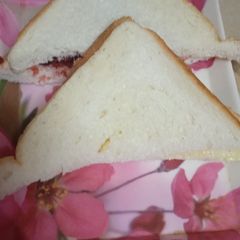 A picture of Cheese and jam toast.