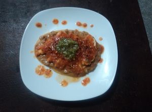 Una foto de Huarache con milanesa de pollo en salsa de tomate cherry geras. México