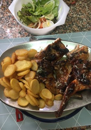 Foto de Coelho assado na brasa