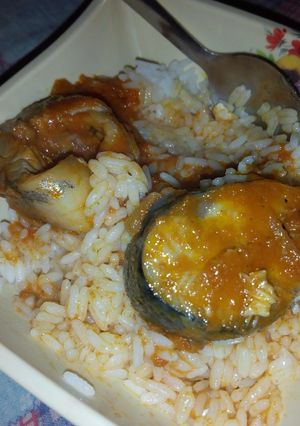 A picture of White rice and stew with fish.
