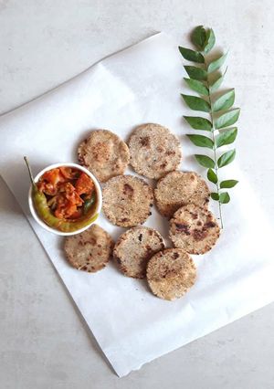 A picture of Jowar Flatbread with Tomato Sabji.