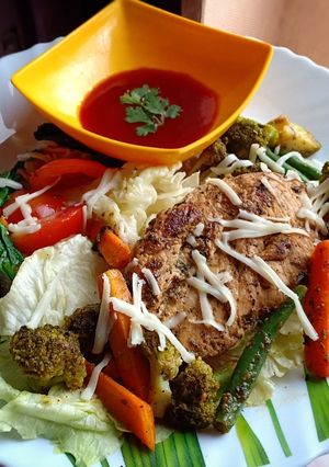 A picture of Pan Seared Chicken Breast with Saute Vegetables.