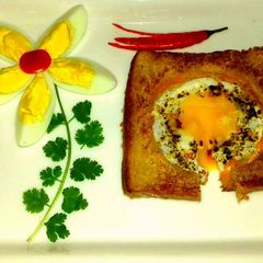 Half Fry Egg With Carrot Sandwich A picture of Half Fry Egg With Carrot Sandwich.
