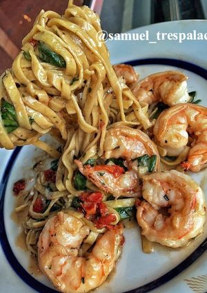 Una foto de Camarones a la Provenzal