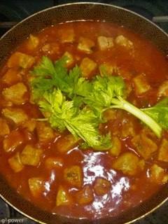 Una foto de Cañon de Cerdo picado en Salsa Roja Taquera