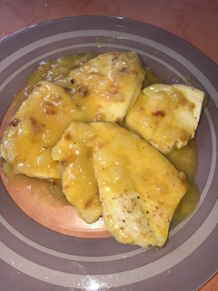 Una foto de Filete de pechuga de pavo con salsa de naranja