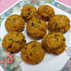 A picture of Moong Dal Paniyaram/Green Moong Dal Vada/Fritters.