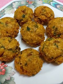 A picture of Moong Dal Paniyaram/Green Moong Dal Vada/Fritters.