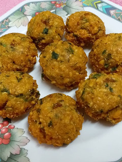 A picture of Moong Dal Paniyaram/Green Moong Dal Vada/Fritters.