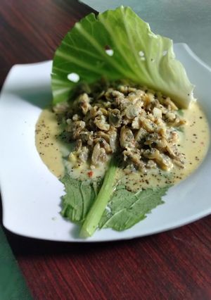 Hình của món Ngao núp lùm xào bơ sữa.