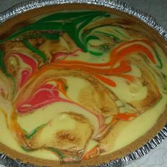 A picture of Chef Warren's Rainbow Cheesecake.