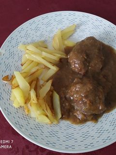 Una foto de Carrilleras de cerdo al vino tinto