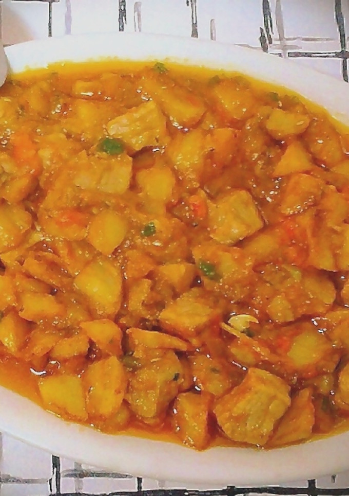 Una foto de Magro de cerdo con sofrito de tomate y patatas fritas