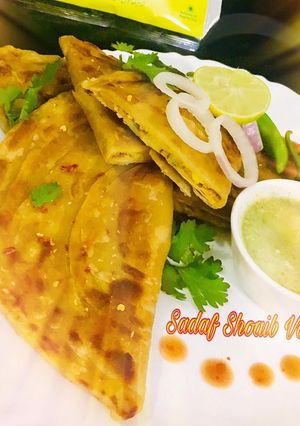 A picture of D shaped Aloo Paratha /Aloo Paratha.