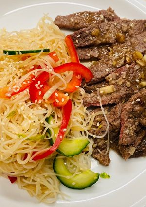 A picture of Asian Fried Steak With Noodle Salad.
