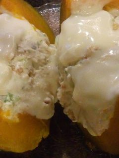 Una foto de Zapallo brasilero relleno. (vegetariano)