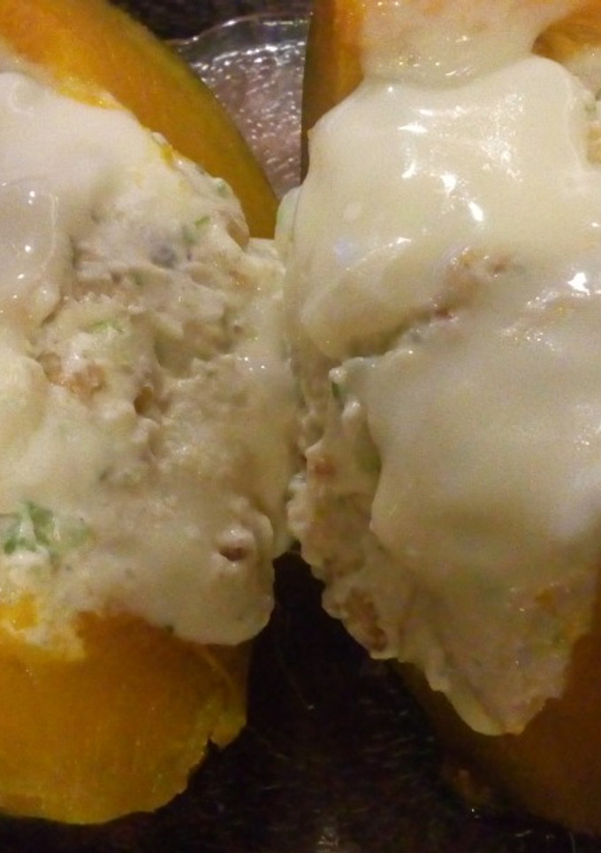 Una foto de Zapallo brasilero relleno. (vegetariano)
