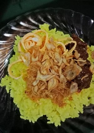 Foto resep Nasi Kuning#5resep terbaruku#Berburucelemekemas#resolusi2019