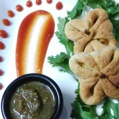 A picture of Corn flower baked Samosa.
