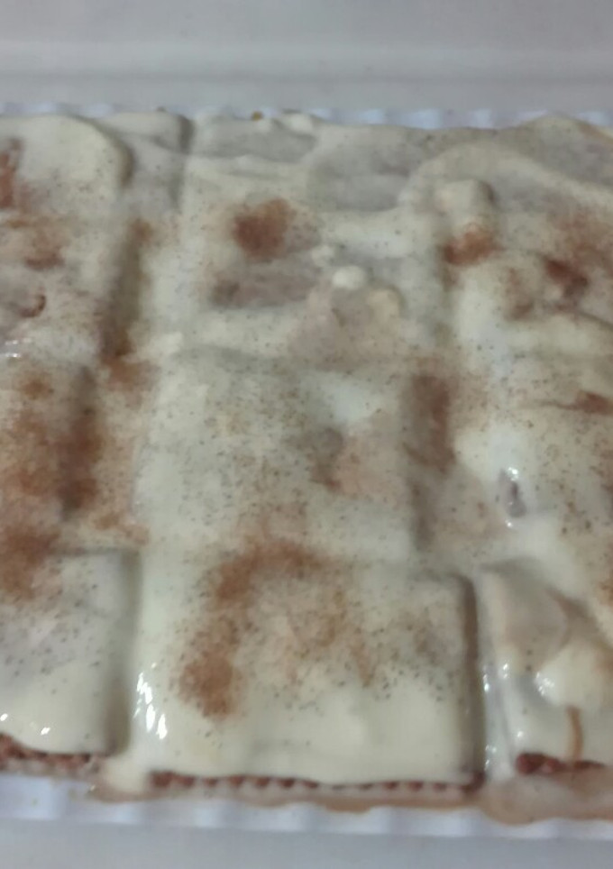 Una foto de Tarta de galletas María con natillas y crema de café