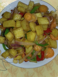 A picture of Fried yam n veggies.