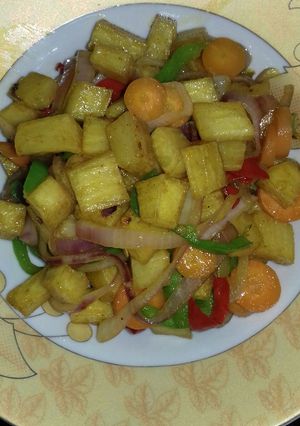 A picture of Fried yam n veggies.