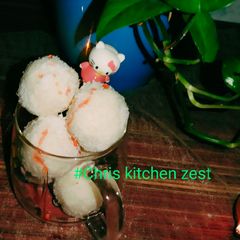 A picture of Stuffed coconut ice ladoo.