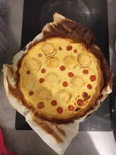 Une photo de Quiche au fromage de chèvre et tomates cerises