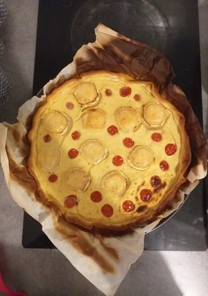 Une photo de Quiche au fromage de chèvre et tomates cerises