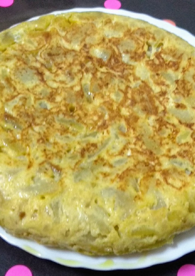 Una foto de Tortilla de patatas con cebolla