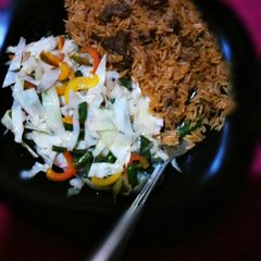 A picture of Pilau with vegatables.